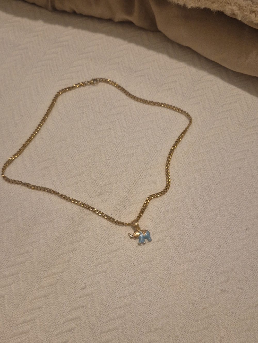 Gold Elephant Pendant Necklace with Light Blue Enamel